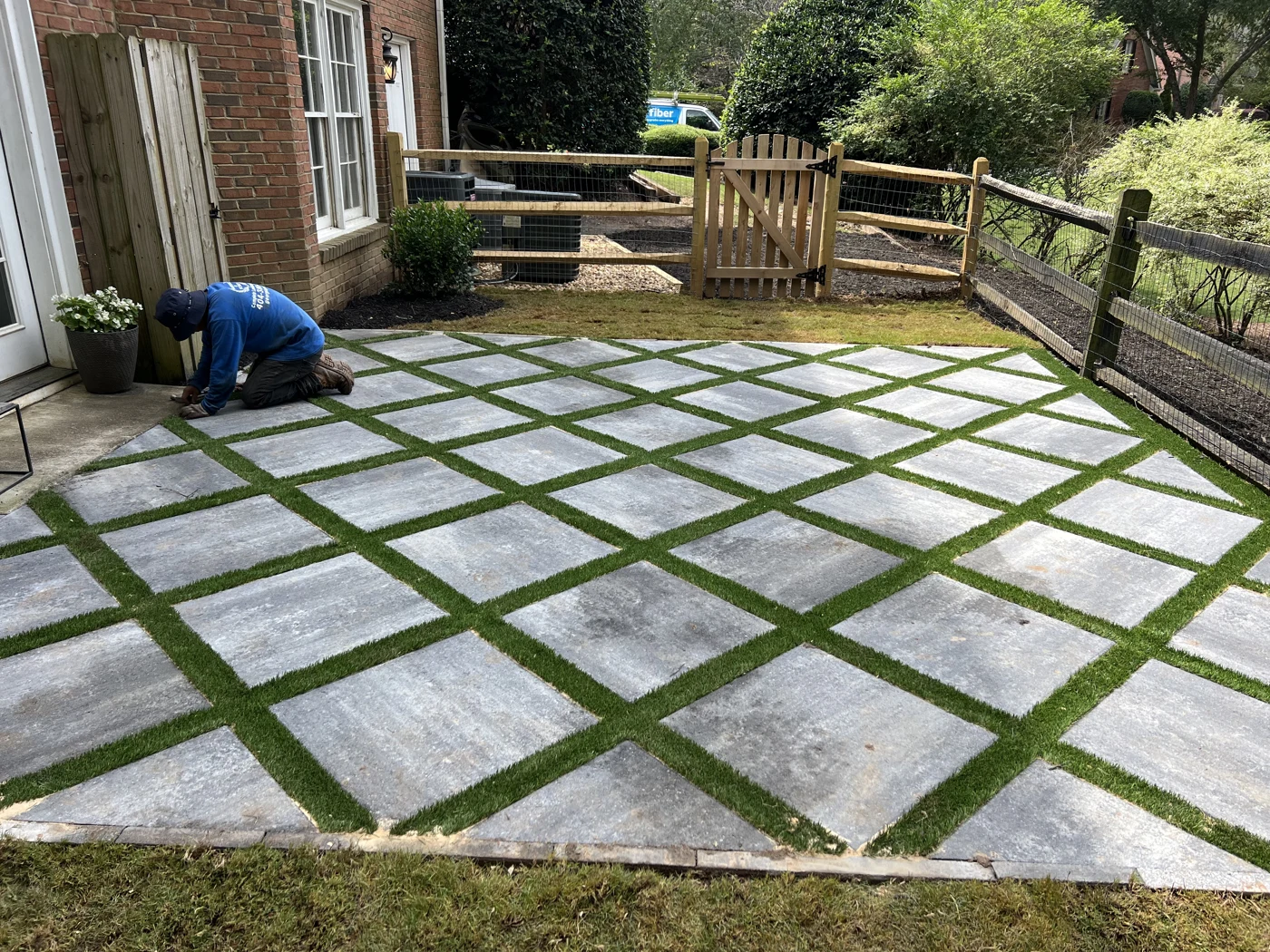 Geometric garden design with lawn and paving stones